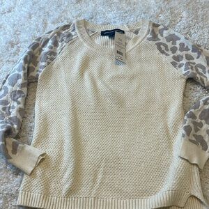 Brand new French Connection Sweater with leopard sleeves.